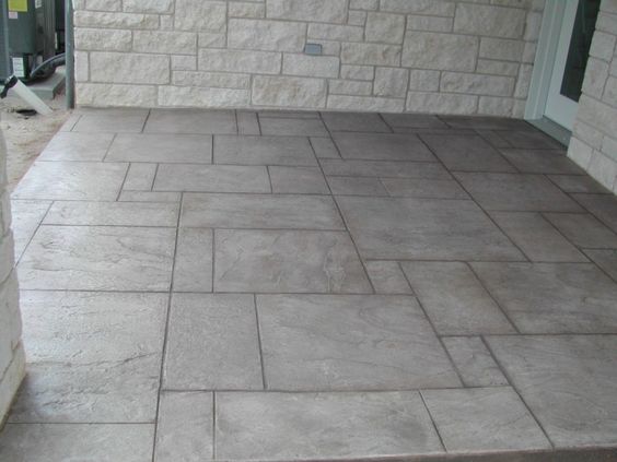 Stamped concrete patio crafted by expert concrete contractors in Riverton, Utah.