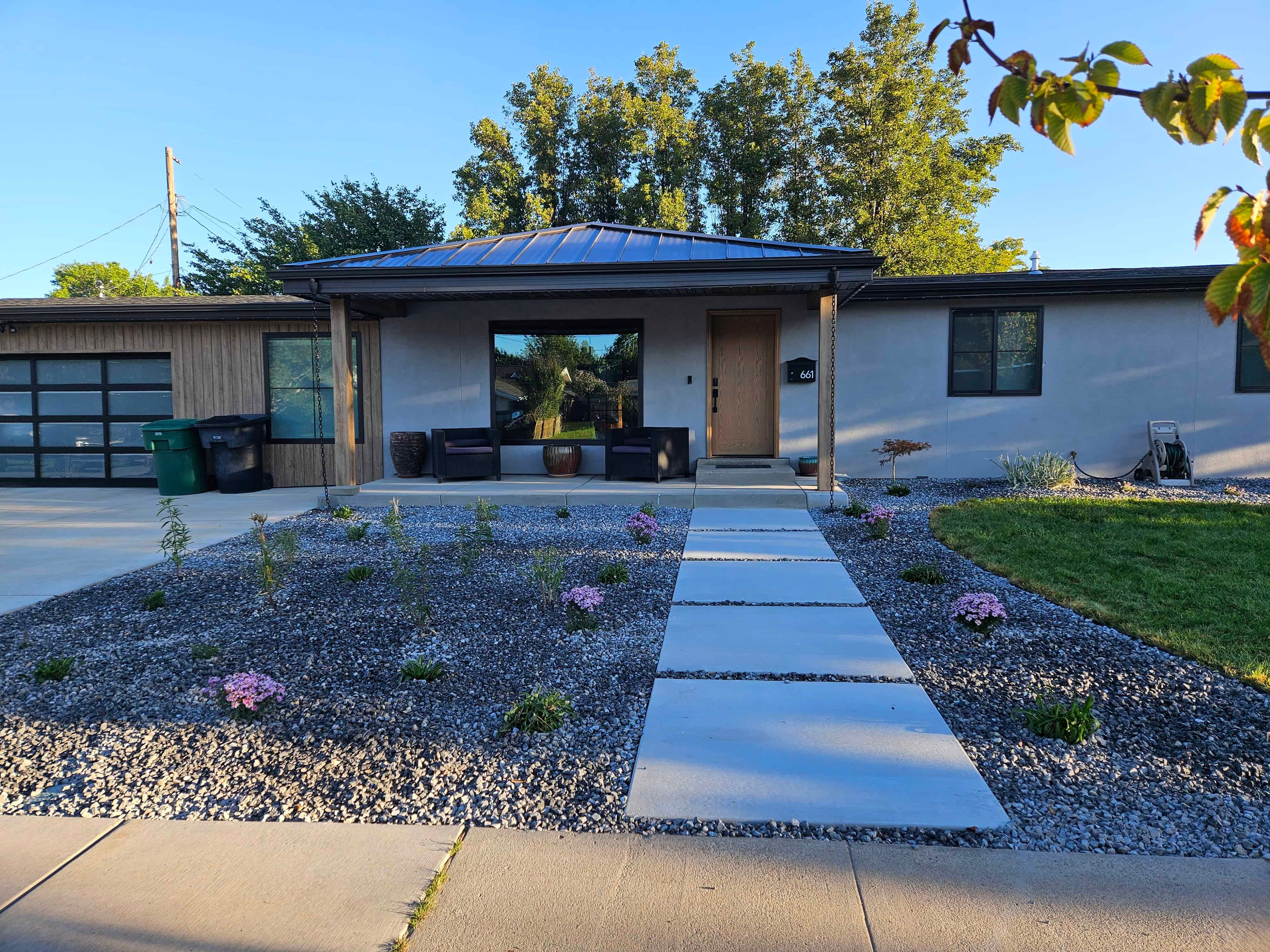 Front concrete walkway in Murray, Utah leading toward the house.
