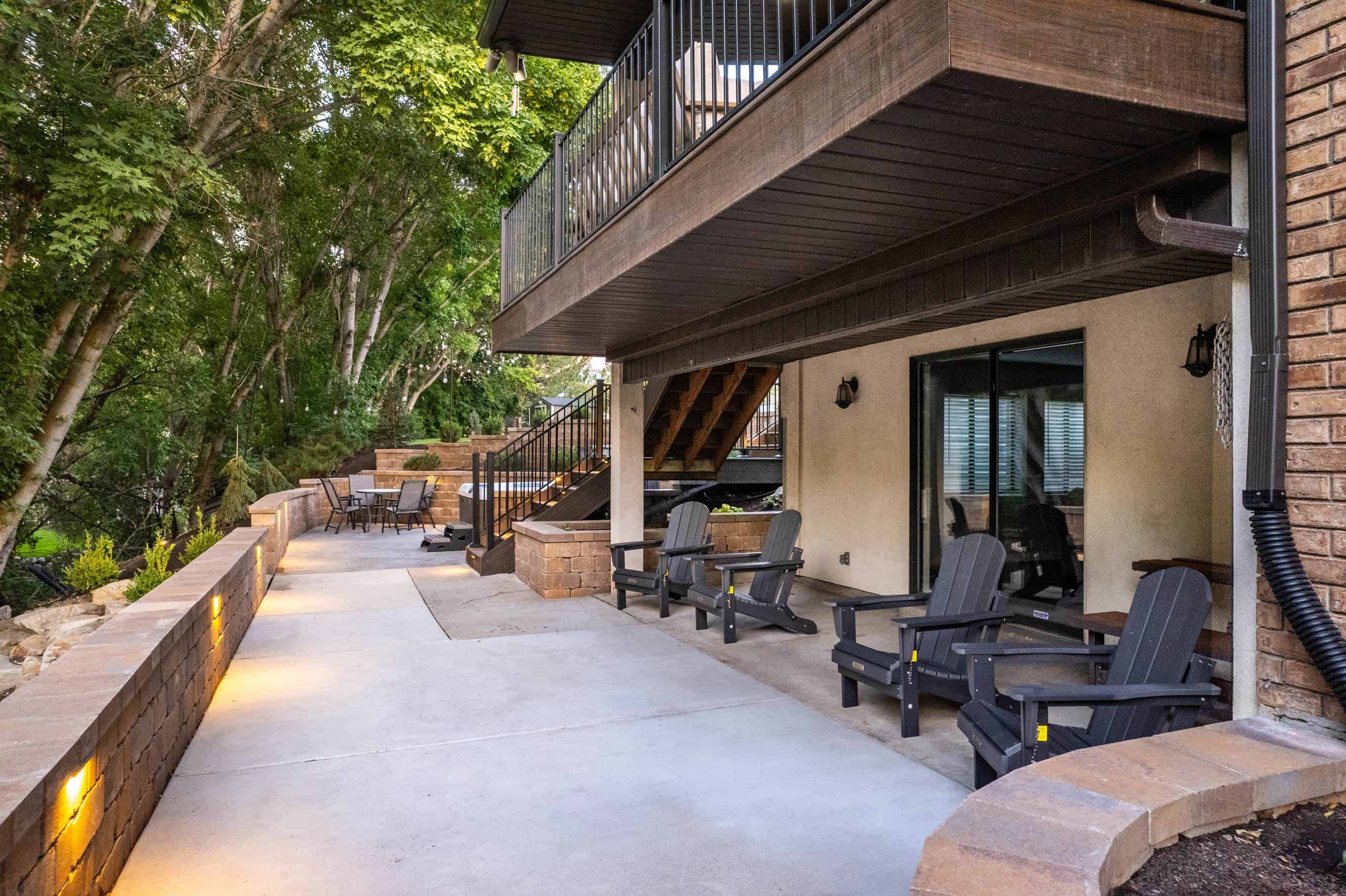 Concrete patio with Murray cypress trees in modern landscape design