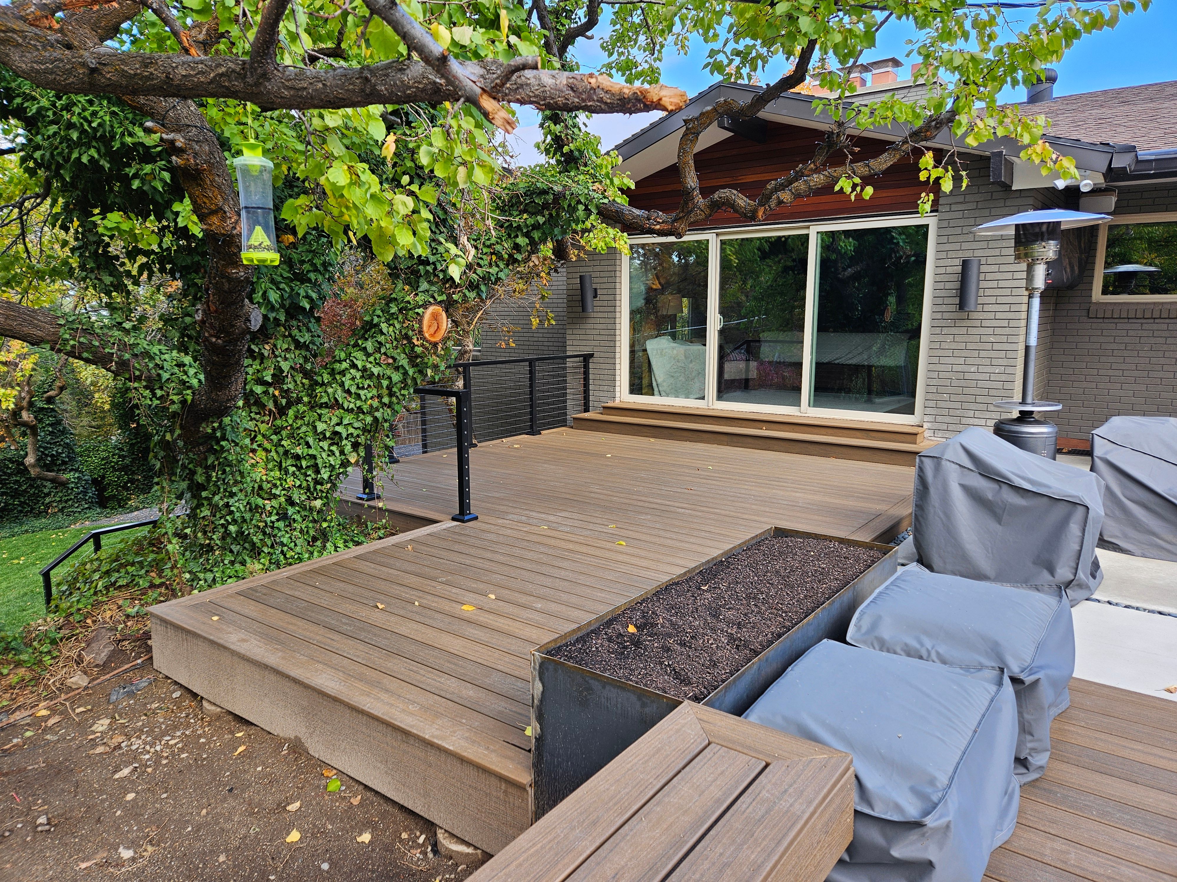 Trex deck installation in Holladay, Utah residential backyard.