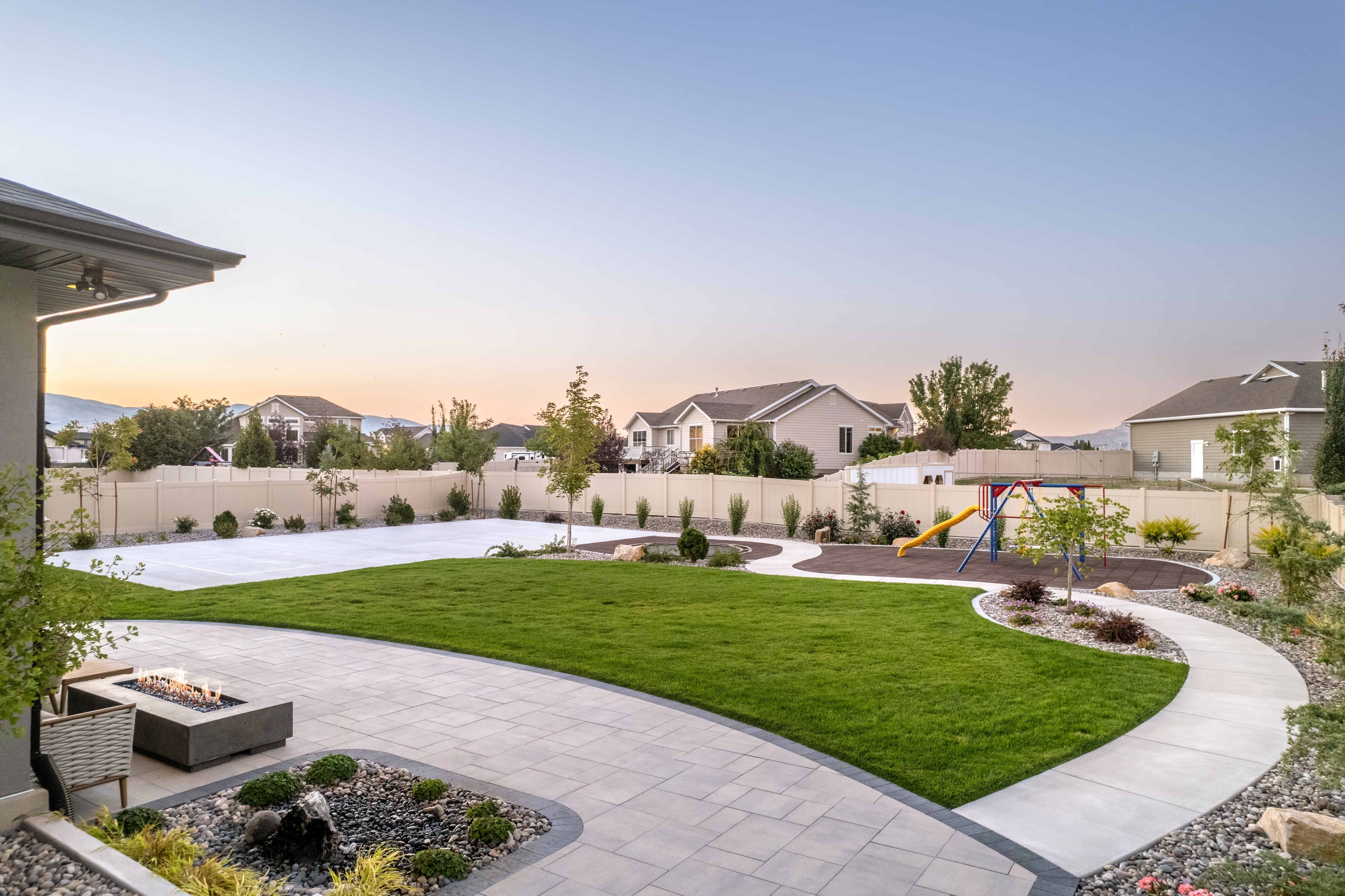 Seamlessly connected interlocking pavers and concrete walkway in Lehi, Utah, creating a cohesive outdoor space.