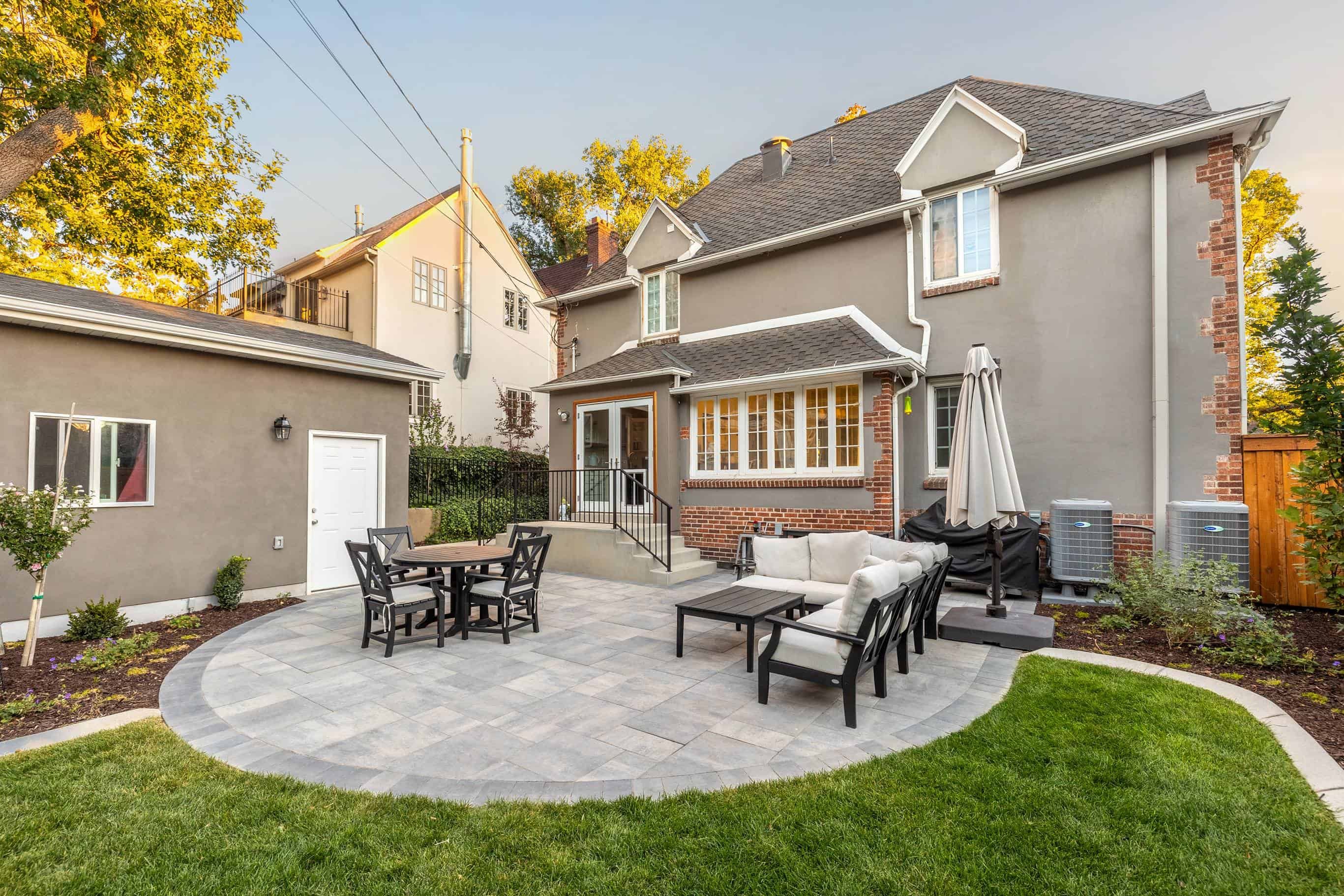 Landscaping design featuring lush greenery and stone pathway