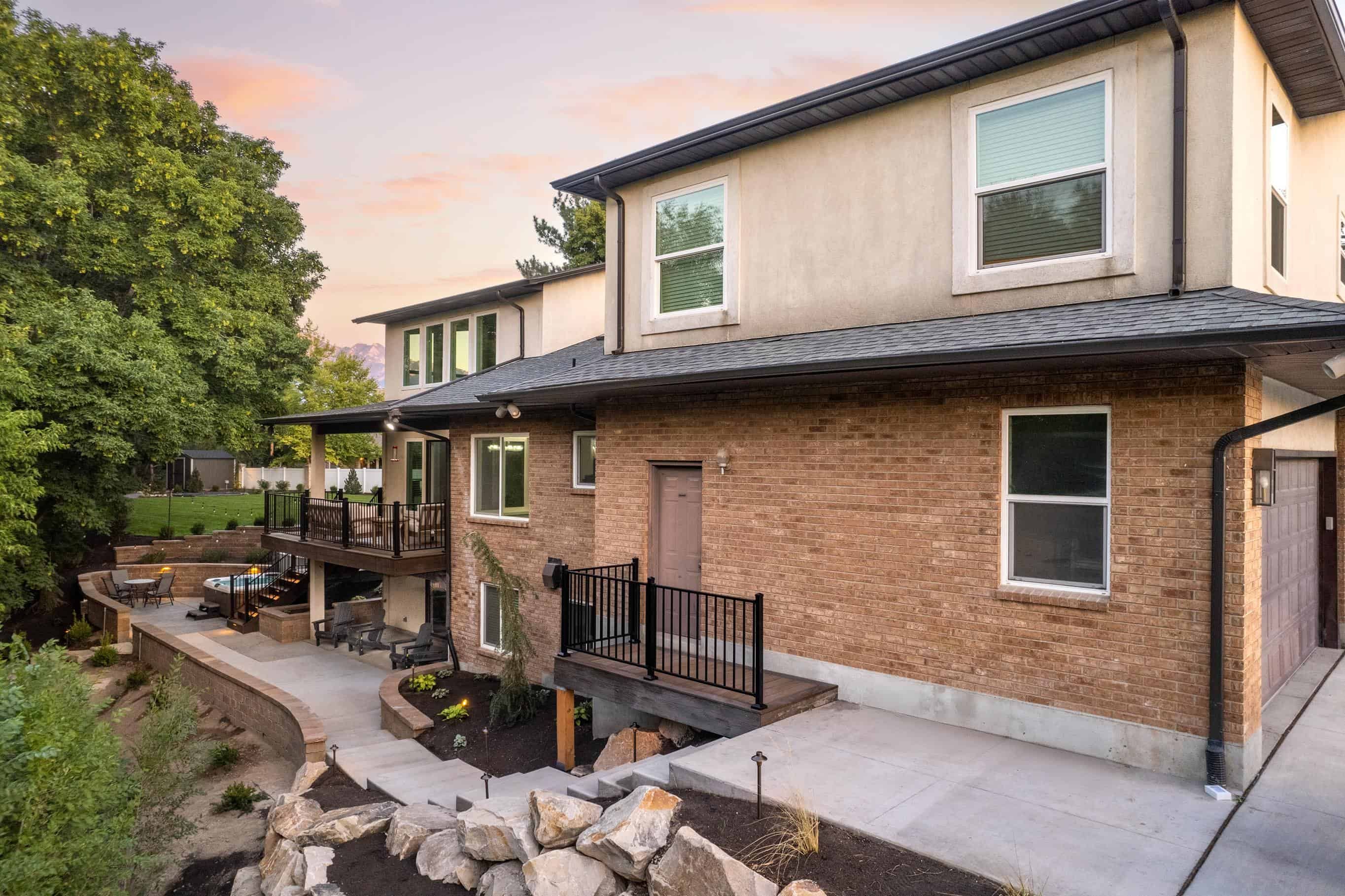 Boulder wall with paver retaining wall in Murray, Utah.