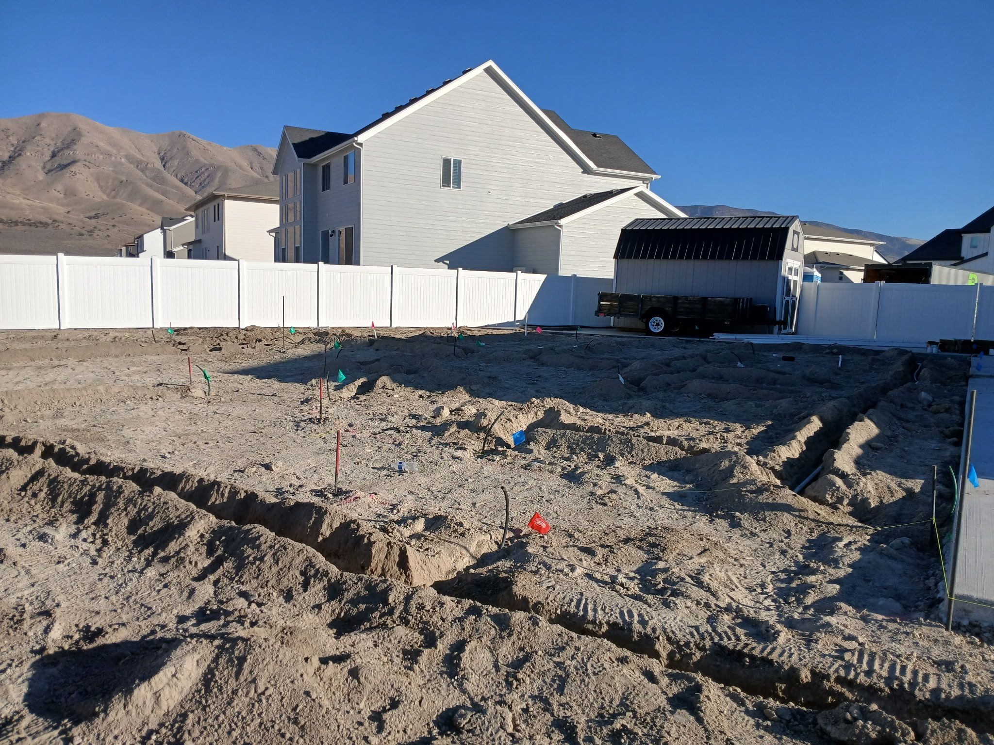 Sprinkler trench location east side yard