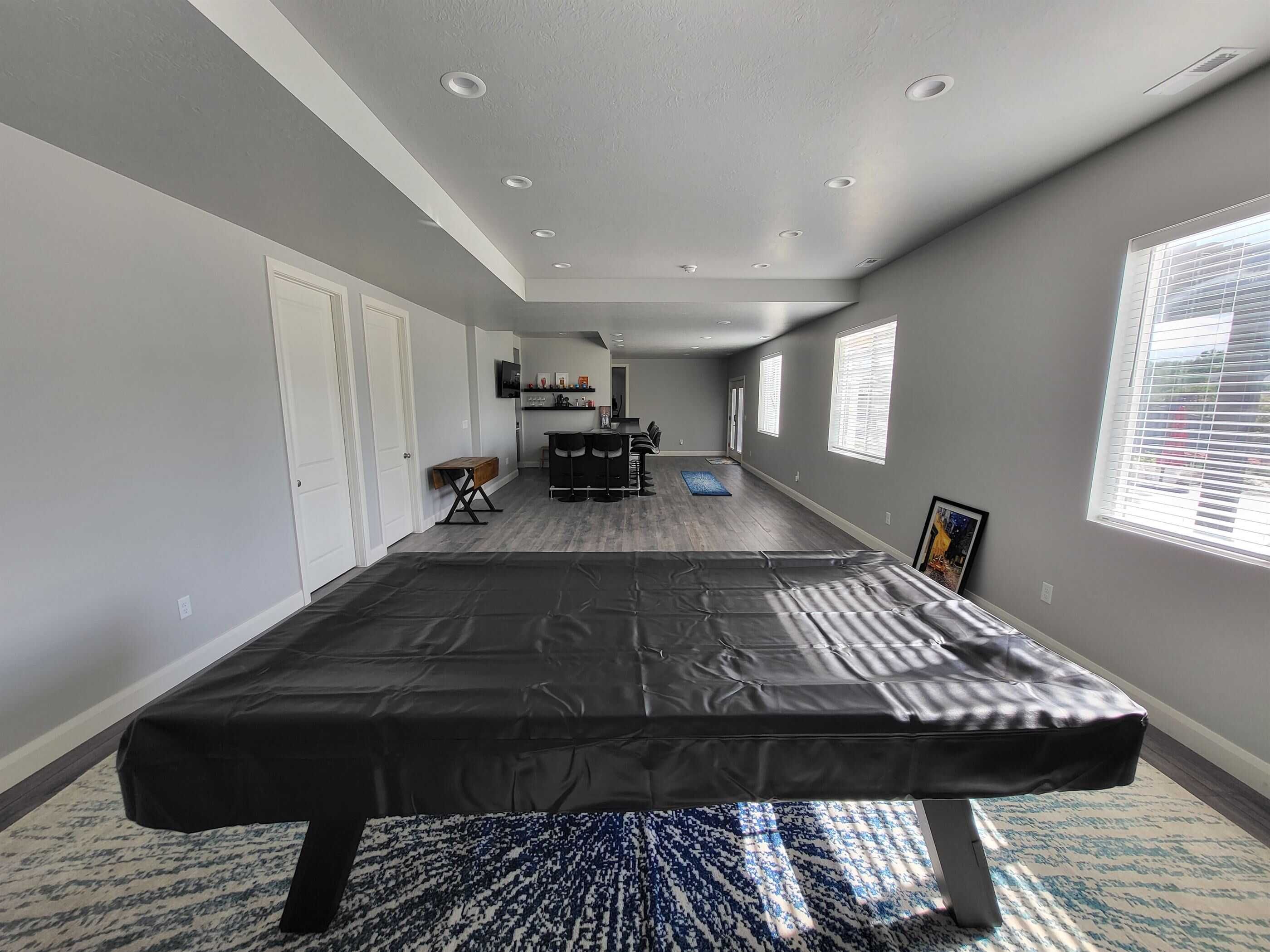 Pool table installation in a custom basement remodeling project in Salt Lake City.