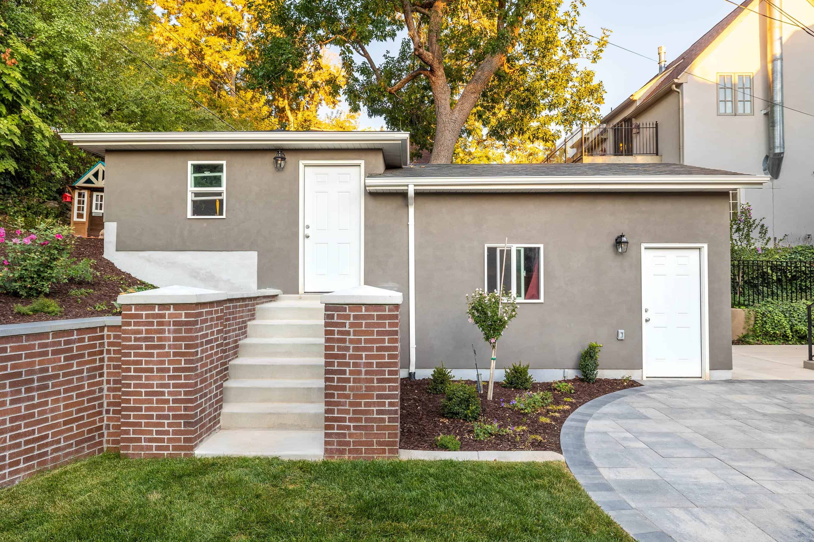 Side view of custom garage construction in Salt Lake City residential project.