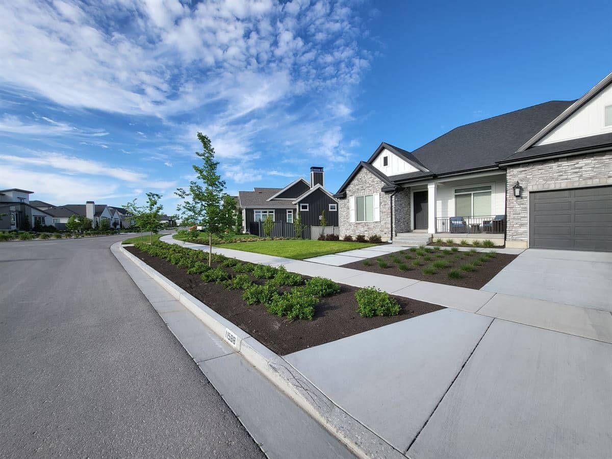 Custom landscape design with boulder wall in Salt Lake City.