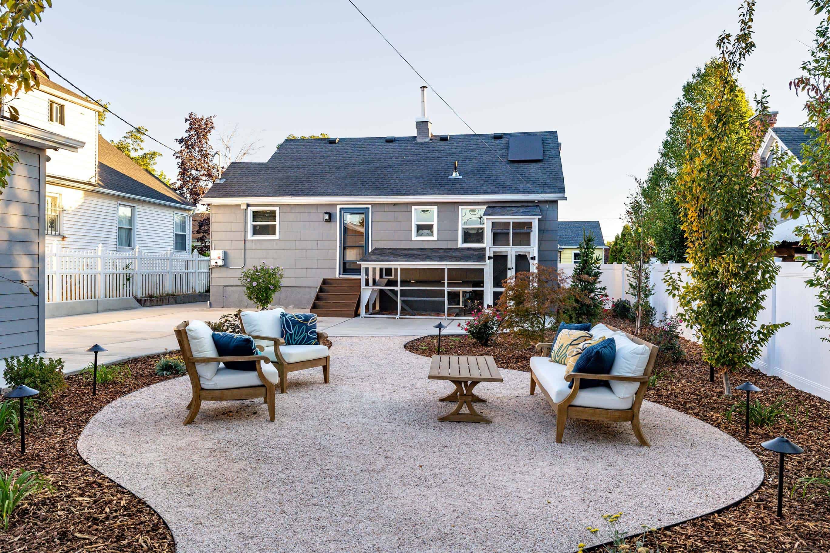 Modern landscape design with vibrant greenery and stone pathway