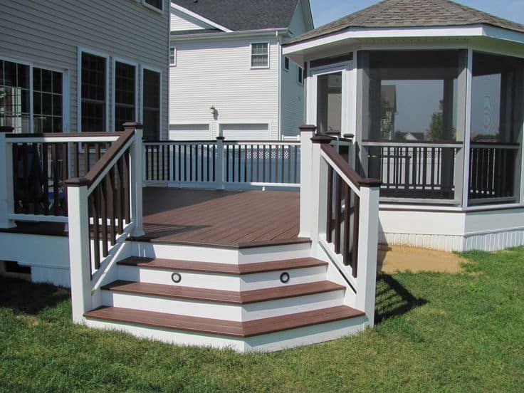 Wood deck with railing in Riverton, Utah | Deck Builders