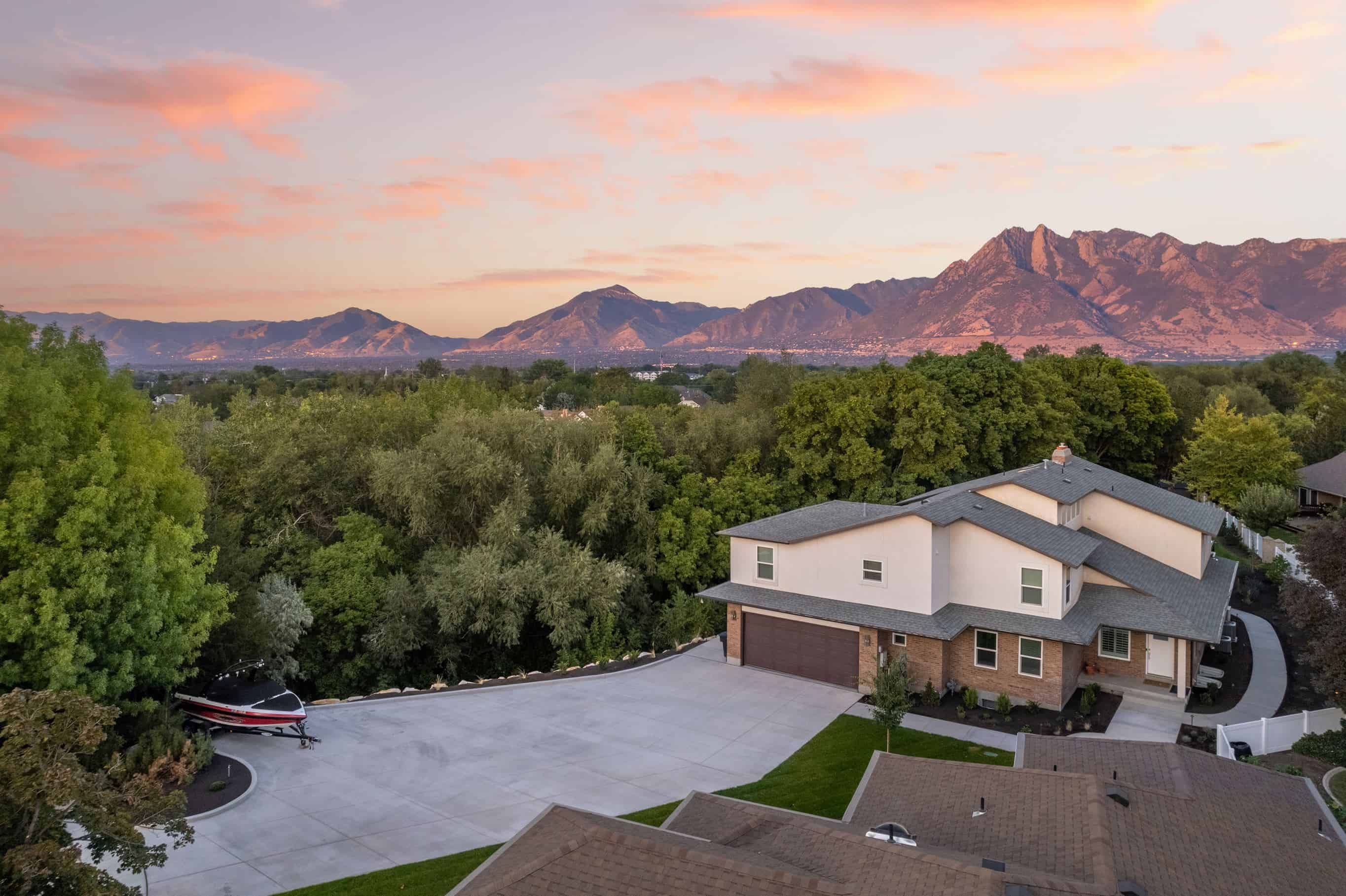 Aerial view of gray concrete driveway and pathways in Murray, Utah.