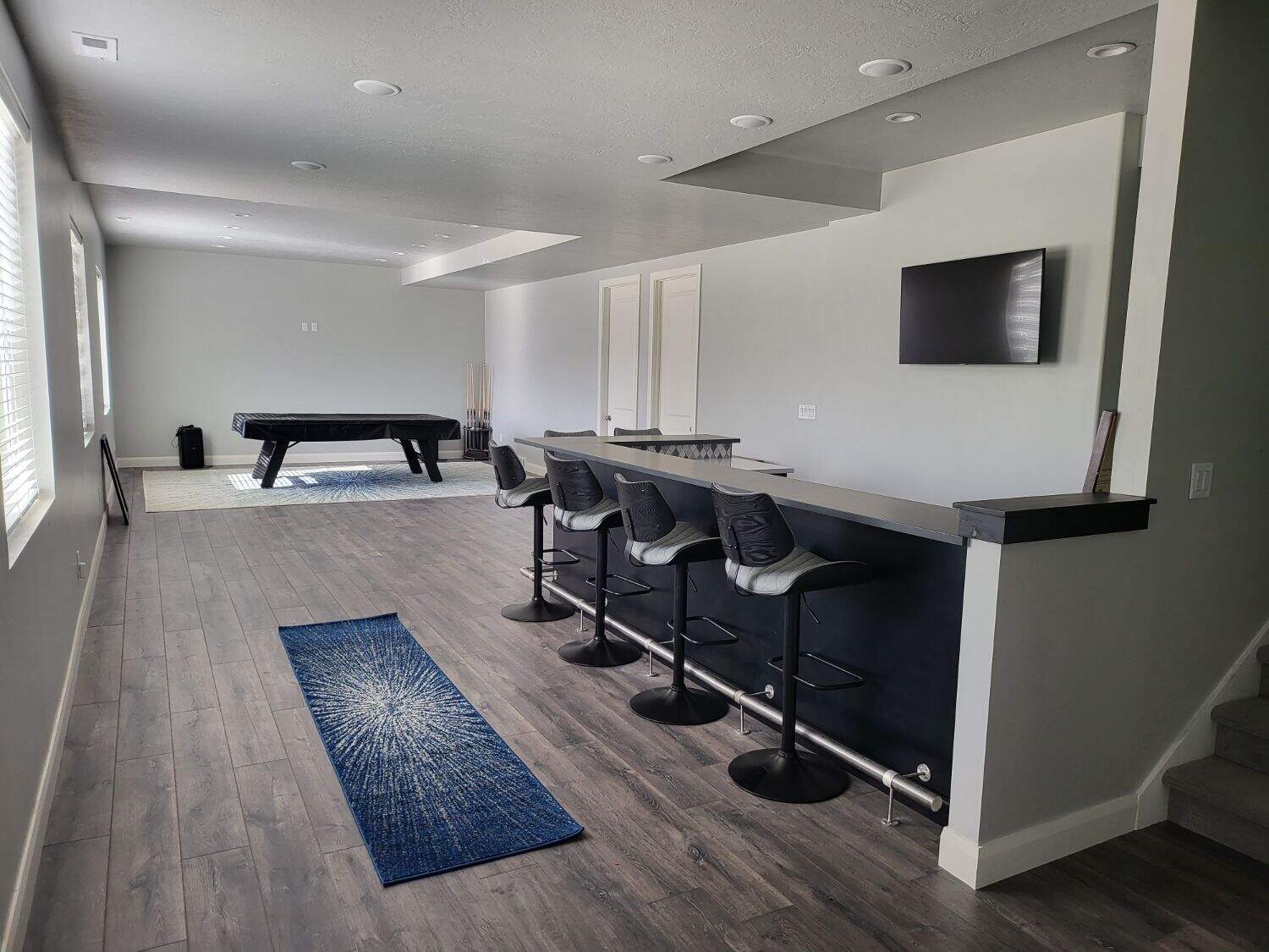 Basement remodeling project with modern design and efficient layout